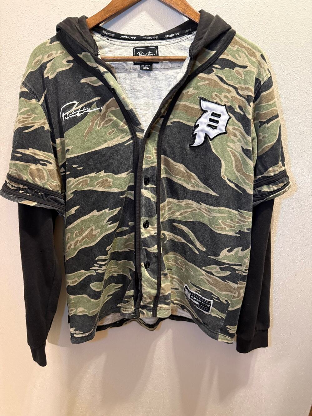 Primitive Skateboarding Men’s Medium Camo Layered Hooded Baseball Jersey